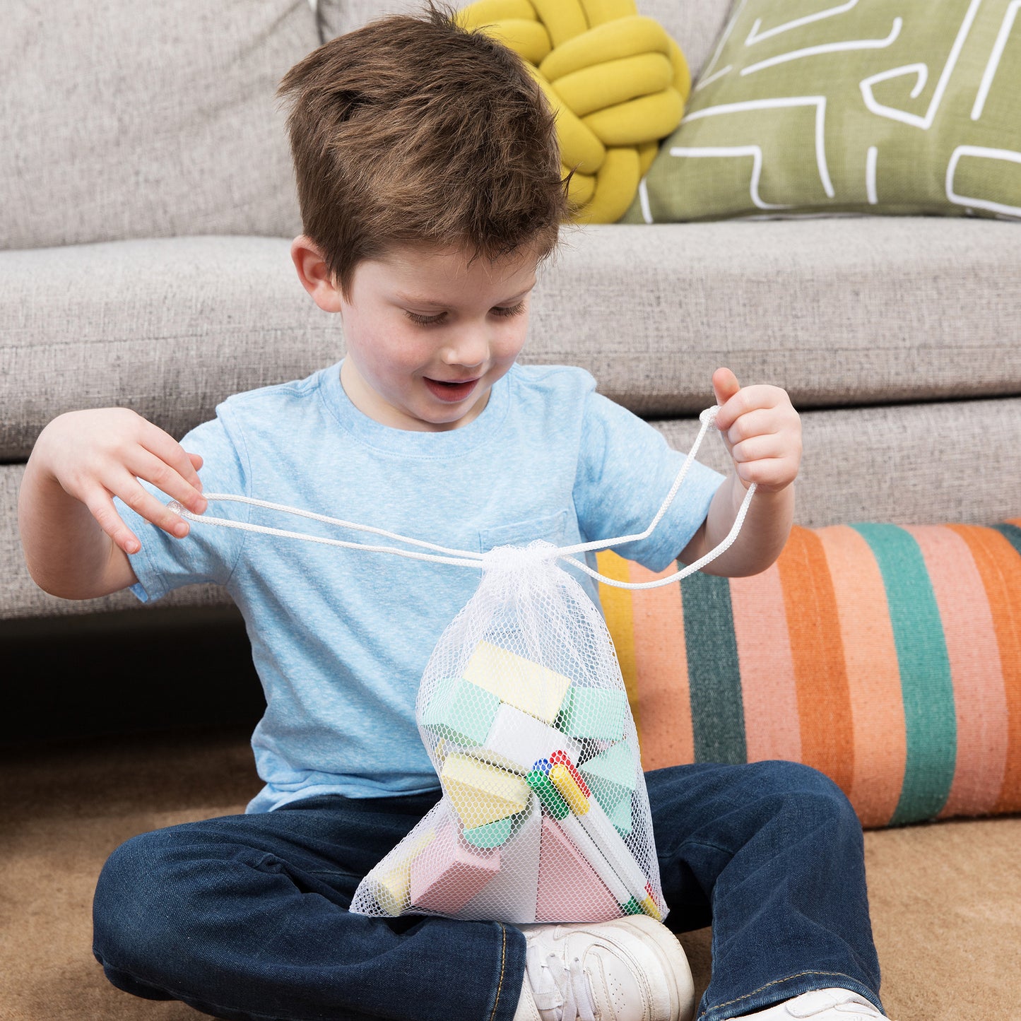 Open-ended play toy with reusable blocks and washable markers