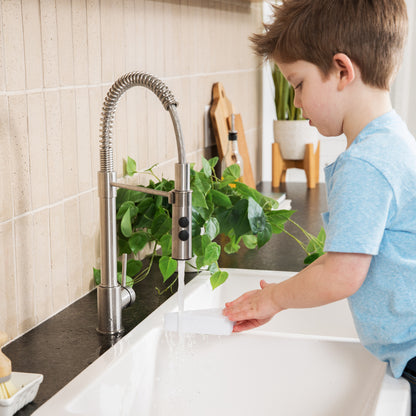 Child washing reusable Build n' Doodle blocks 