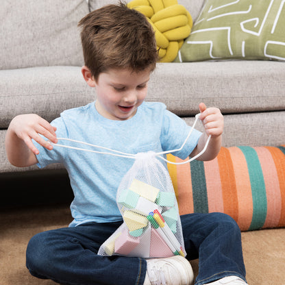Open-ended play toy with reusable blocks and washable markers